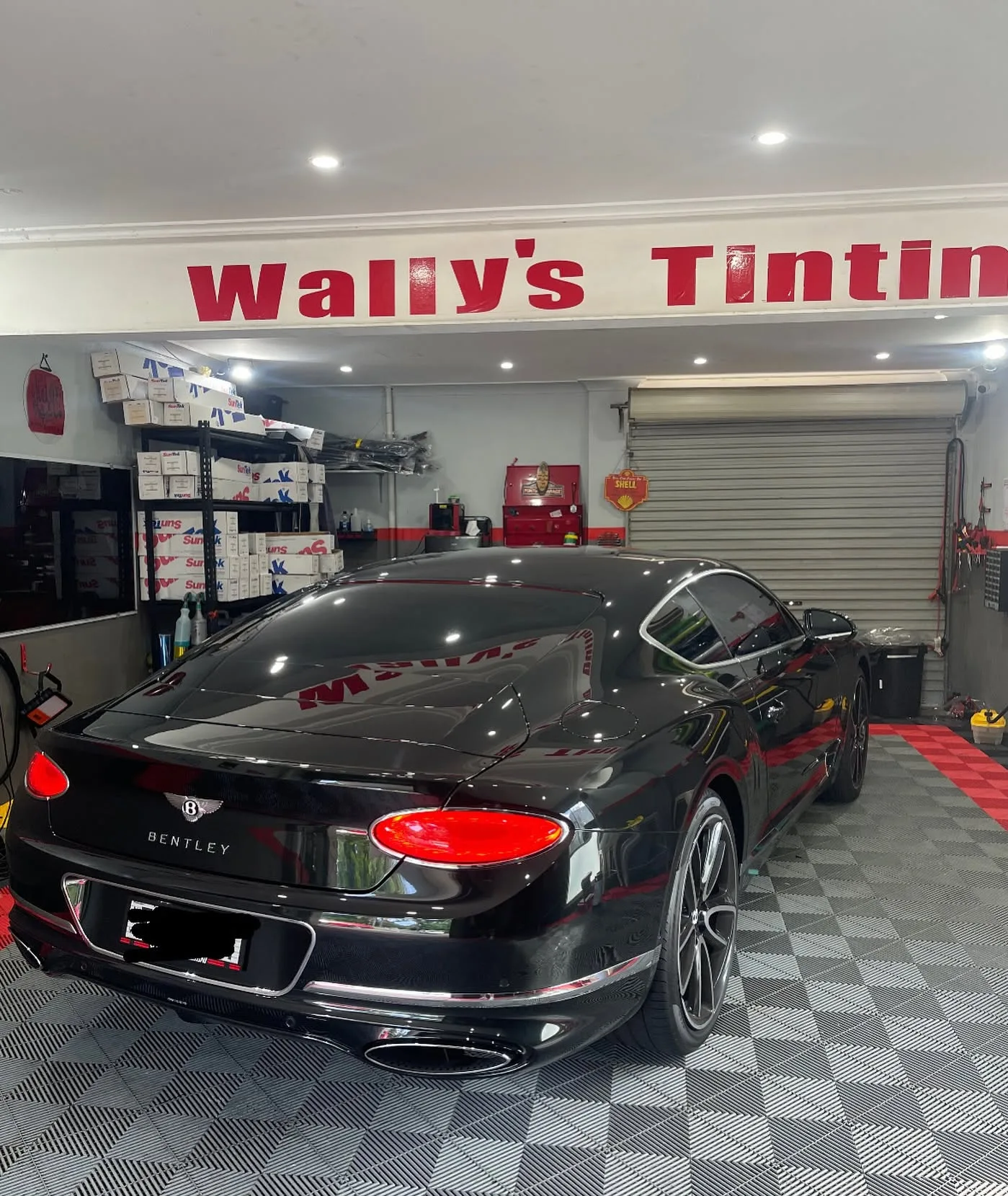 Black Bentley with tinted windows in Wally’s project archive