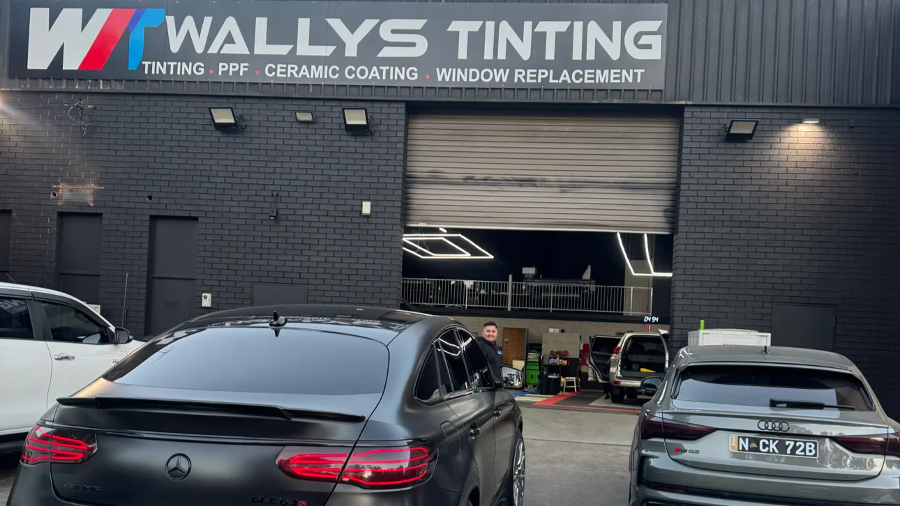 Cars outside Wally’s Tinting workshop in Bankstown
